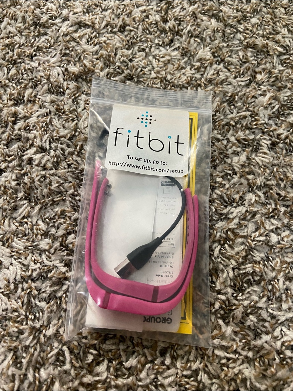 Pink fitbit Flex Bands and Charging Cable